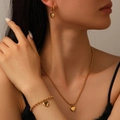 Golden heart pendant jewelry set featuring bead chain necklace, earrings and bracelet - Gold Bead 3-Piece Set (I310-I216-H213)