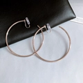 Silver round clip-on hoop earrings with comfortable silicone pads on black leather - Large Hoop Clip-on / Diameter 55mm / Silver
