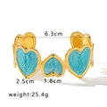 Detail of gold-plated heart bracelet showing blue enamel texture and 6.3cm diameter size - Blue Style (NB-B6090-BU)