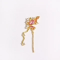 Detailed macro shot of golden butterfly earring with pink gemstones and long crystal tassels - Gold Pink Gemstone Pearl Tassel Butterfly Style