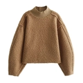 Detailed macro view of brown textured fleece fabric and ribbed neckline on sweater - S / Khaki