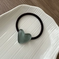 Close-up of heart-shaped hair clip on a white ceramic tray with deep wood background - Hair Tie / Jelly Heart Hair Tie-Green