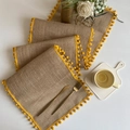 Jute table runner with yellow pom-pom trim in a minimalist Nordic design for weddings - Jute Yellow Pom-pom