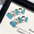 Handmade press-on nail set featuring blue cat-eye stones and golden brushed textures - XS / 2154-Super Short Trapezoid