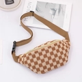 Close-up of checkered knit waist bag with adjustable strap and premium tactile texture - Brown