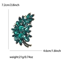 Vintage emerald green rhinestone tree brooch with gold alloy base and crystal accents - Antique Gold Green
