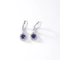 Silver-plated earrings featuring deep blue round gemstones with sparkling halo setting - Sapphire Blue