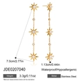 Dettaglio di orecchini a nappa in oro 18K con stelle di zircone e specifiche - Stile Nappina Lunga con Stella (JDE0207040)