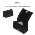 Portable black velvet jewelry box with metal snap closure for rings and earrings - Black
