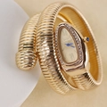 Fashionable gold snake wrap watch with crystal-set dial and dual-coil tubogas band - Gold