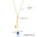 Long Y-shaped stainless steel necklace with blue resin teardrop pendant and gold finish - Blue Resin Necklace (TXP212)