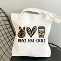 White Peace Love Coffee canvas tote bag with leopard print heart and cup on a black chair - Brown Peace Hand Gesture Style (B100310-TBWH-M)