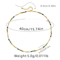 Bohemian multicolored beaded necklace with red and green stones and golden clasp - Colorful Beads (KN0300)
