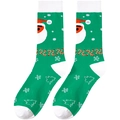 Detail of Christmas crew socks with green knit base and Santa Claus pattern - One Size / Green Santa Claus Candy Cane Style (A1262)