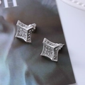 Macro shot of silver square geometric stud earrings with micro-paved white zircons - D7 Silver Star Square
