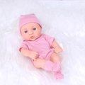 20cm reborn baby doll in pink striped romper and matching hat on white plush - Striped Pink