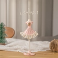 Detailed view of pink resin ballet dress jewelry stand with metal hooks on lace - Pink Style 3