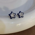 Star-shaped earrings with dark blue enamel border and white cubic zirconia stone - Stud Earrings Pair / Blue Star
