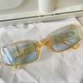 Y2K vintage rectangle sunglasses with translucent amber frame and light blue lenses - Paperclip Yellow Frame Blue Lens Y2K