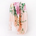 Detail of floral silk square scarf in pink-orange with peony prints on a pedestal - 90x90cm / Pink (D9026)