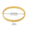 Detailed macro view of 18K gold plated stainless steel bracelet with 5A zircon inlays - Gold