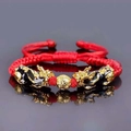 Handmade red braided rope bracelet featuring dual gold Pixiu and lucky bead charms - Red Rope Double PiXiu