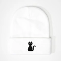 White knitted beanie featuring a minimalist black cat embroidery with a folded cuff design - White