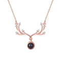 Rose gold reindeer antler necklace with blue projection stone and sparkling crystals - Eight Diamond Antler Rose Gold