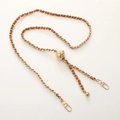 Adjustable gold metal and brown leather braided crossbody strap with ball slide buckle - Tan