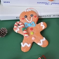 Gingerbread man Christmas ornament with frosted glitter finish and a red hanging string - Blue Bowknot Cane (Height 13cm)