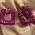 Detailed macro shot of large square chain earrings encrusted with rose red rhinestones - Rose Red Square