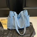 Minimalist light blue denim tote bag with wide straps and multiple functional pockets - Blue Denim