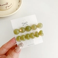 Set of two emerald green jelly heart and round bead hair clips for styling women fringe - Light Green