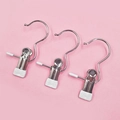 Set of 3 stainless steel boot clips with white rubber tips on a pink background - Set of 3 / White