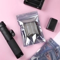 Silver anti-static resealable bag protecting a FeiyuTech 18650 lithium battery - 10*13cm