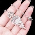 Tree of Life healing crystal energy pendulum with white crushed quartz and silver chain - Howlite