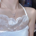 Elegant silver bow necklace with iridescent teardrop pendant on a delicate chain - Silver Water Drop Pendant Necklace (XL1696)