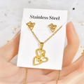 Close-up of a gold hollow heart jewelry set with stainless steel necklace and earrings - Hollow Heart
