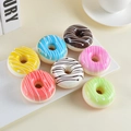 Set of seven colorful PU artificial donuts with striped icing on a white display tray - 7cm Diameter, 3cm Height / Set of 7 Assorted