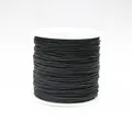 Detailed view of 0.8mm black braided cord roll for DIY jewelry making and knots - Color 900 Black
