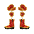 Detailed view of handmade beaded cowboy boot and hat earrings with red XO heart - Style 6 Red XO