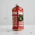 Ornamento natalizio a cabina telefonica rossa in vetro con glitter dorati e ghirlanda - Cabina Telefonica