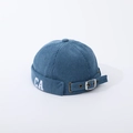 Detail of blue corduroy brimless docker hat featuring CA embroidery and adjustable metal buckle - Blue