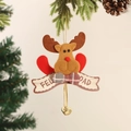 Plush Christmas reindeer ornament with Feliz Navidad banner and gold bell on a tree - Reindeer With Bell Tag