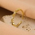 Adjustable gold bow ring with five sparkling crystals and beaded edge detailing - Gold Beaded Zirconia Ring (11292)