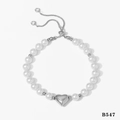 Bracciale regolabile con cuore d'argento, perle bianche e chiusura stile bolo - Bracciale Argento (B547)