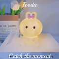 Cute bunny LED night light with soft silicone texture and a decorative purple bow - Bow Rabbit