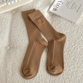 Brown mid-tube cotton socks featuring bow embroidery and striped texture in a cozy style - One Size / Coffee