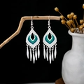 Detailed close-up of bohemian silver drop earrings with green enamel and long tassels - Tear-drop Tassel Blue/Green Enamel Style (E2801)