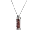 Macro shot of silver perfume bottle pendant with reddish-brown crushed stones inside - Red Jasper Chips